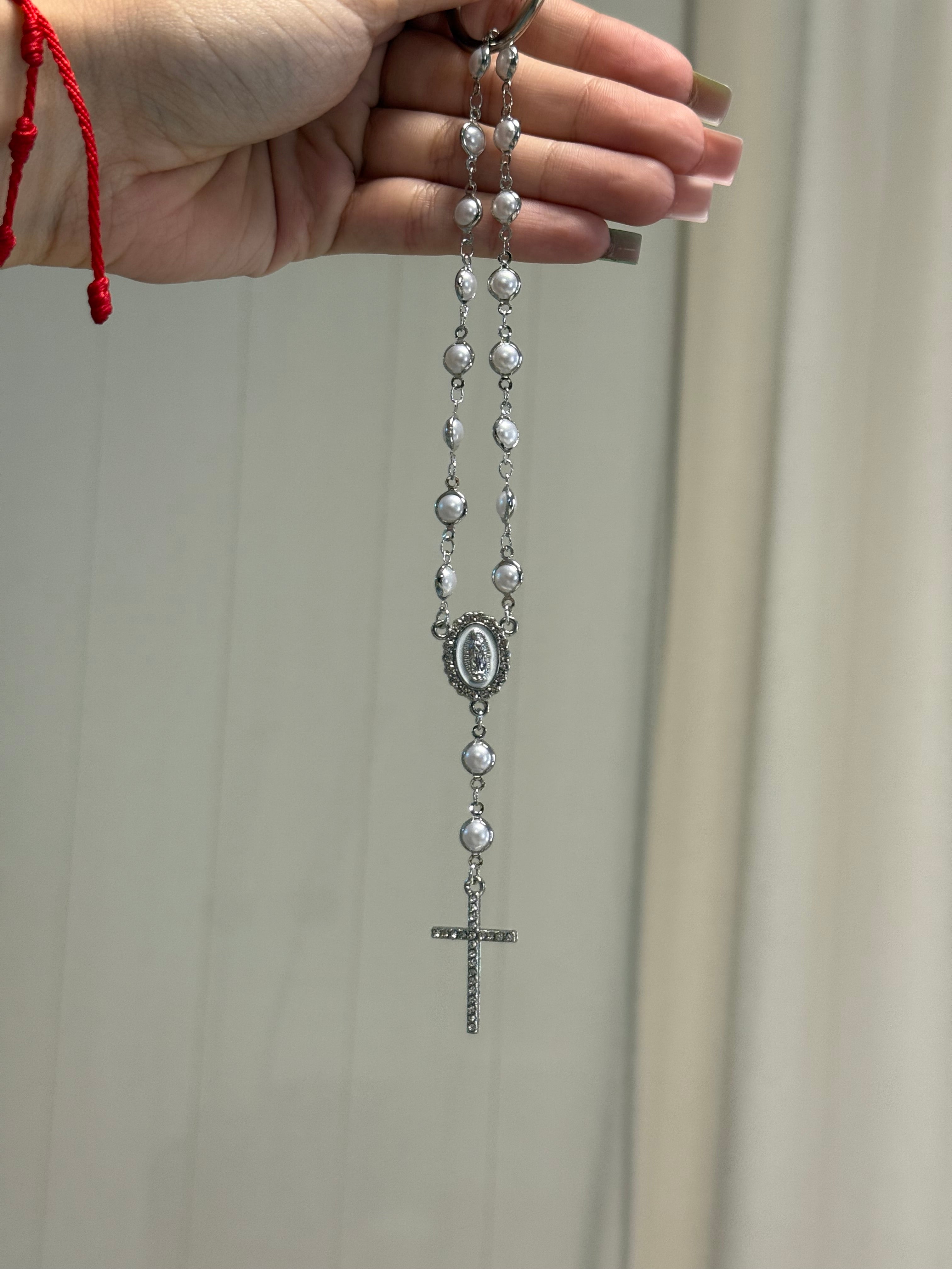 Car Rearview Mirror Rosary

Terço para Pendurar no Espelho do Carro